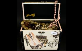 A Jewellery Box containing a quantity of costume jewellery, mainly beaded necklaces,