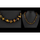 A Very Nice Quality Antique Heavy and Solid Tiger - Eye Beaded Necklace,
