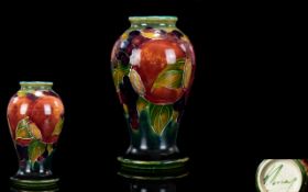 William Moorcroft Signed Small Vase ' Ochre Pomegranate Design. Date 1920 - 1924.