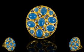 Blue Jade and Tanzanite Statement Ring, oval and round cut cabochons of blue jade totalling 8.