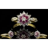 18ct Gold Ruby and Diamond Cluster Ring. Flower head Setting, Diamond Shoulders.