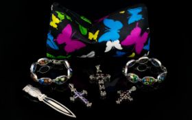 A Collection of Contemporary Silver Items To include two silver set millefiori bracelets,