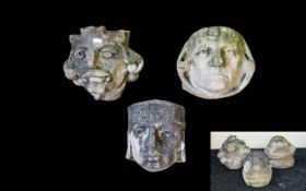 A Collection Of Reconstituted Stone Capitals Three in total, each in the form of medieval knights,