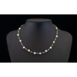 Ladies - Floating Design 14ct Gold Wire and Pearl Necklace. The Pearls with Gold Spacers and Clasp.