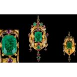 An Early 19th Century Superb Renaissance Revival Emerald And Ruby Pendant Set with a large central