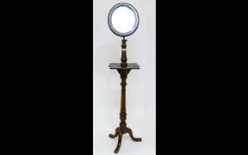 A Gentleman's Victorian Mahogany Shaving Stand Adjustable mirror on turned support with shaped