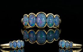 Contemporary and Attractive Five Stone Blue Opal Set Ring, fully hallmarked for 9ct 375.