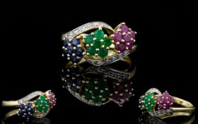 Ladies - Attractive 9ct Gold 3 Cluster Dress Ring, Set In Emeralds, Ruby's and Sapphires.