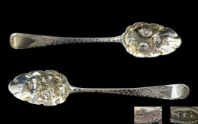 George III Newcastle Matched Pair of Silver Berry Preserve Spoons.