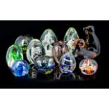 A Collection of Glass Paperweight (12) in total.