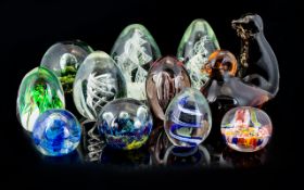 A Collection of Glass Paperweight (12) in total.