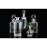 Collection Of Four Decanters And An Oil Pourer.