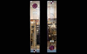 A Pair Of Leaded Mirrored Panels Two rectangular bevelled glass panels with leaded and stained