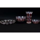 A Collection of Four Decorative Stained Red Glass Crystal Pieces comprising large flower vase,