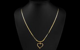 Contemporary Designed 9ct Gold Chain with Attached 9ct Gold Heart Shaped Pendant.