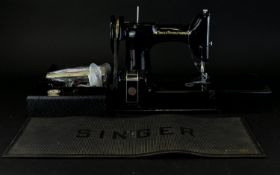 Singer Table Top Sewing Machine by 'The Singer Manufacturing Co'. Complete with case and accessories