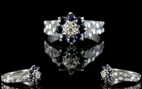 Ladies 18ct White Gold Sapphire and Diamond Dress Ring, Flower head Setting.