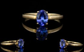 Tanzanite Set Single Stone Set 9ct Gold Ring. Tanzanite of Excellent Colour and Clarity.