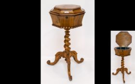 A Ladies Victorian Walnut Workbox Octagonal shaped top with silk lined interior,