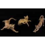 Set of Three Decorative Carved Wood Cat Figures, made to resemble soapstone.