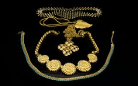 A Mixed Collection Of Gold Tone Costume Jewellery Necklaces Over twenty items in total to include