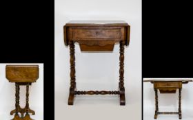A Ladies Victorian Walnut Worktable With drop leaves, frieze drawer and sliding well.