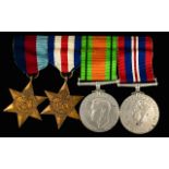 World War II Set of 4 Military Medals and Pin Bar. Comprises 1/ 1939 - 1945 Star.