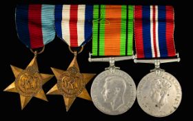World War II Set of 4 Military Medals and Pin Bar. Comprises 1/ 1939 - 1945 Star.