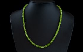 Peridot Rondelle Bead Necklace, over 100cts of the bright green peridot, presented, unusually,