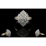 Attractive 9ct Gold Marquise Shape Diamond Set Cluster Ring of Solid Construction.