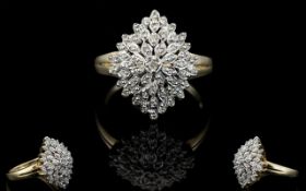 Attractive 9ct Gold Marquise Shape Diamond Set Cluster Ring of Solid Construction.
