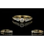 Ladies 9ct Gold Single Stone Diamond Ring with Diamond Shoulders.