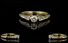 Ladies 9ct Gold Single Stone Diamond Ring with Diamond Shoulders.