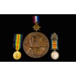 Great War 1914 - 1918 Medal Trio and Death Bronze Plaque. Awarded to 200309 PTE J.