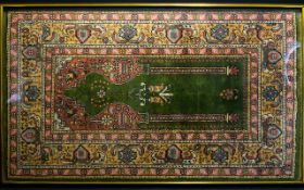 Persian Prayer Mat in Wooden Glass Frame. 43 by 25 inches.