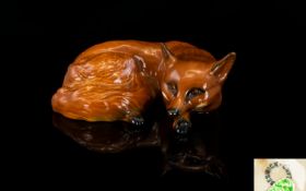 A Beswick Fox - In Sleeping Position. Approx Size 3.5 by 3 Inches. Beswick - England Stamps to Base.