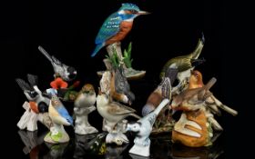 Collection Of Assorted Decortive Bird Figures .
