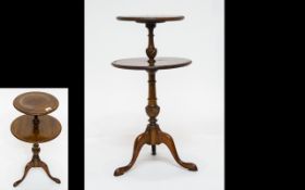 Edwardian Mahogany Dumb Waiter Of small proportions with turned support on tripod base,