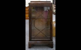 A Mid 20th Century Small Display Cabinet, Astral Glazed Front, Two Glass Shelves.