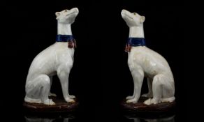 Italian - Pair of Large and Impressive Ceramic Hand Painted Figurines of Whippets - Seated. c.