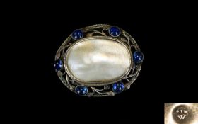 Arts And Crafts Mother Of Pearl Set Brooch Oval brooch set in pewter tone metal with aesthetic style