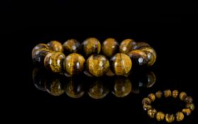 Tiger Eye Large Round Bead Bracelet, unusually large, round, faceted beads of tiger eye with an
