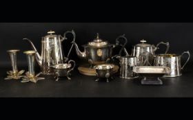 A Collection Of Silver Plated Ware To include four piece tea set, three piece tea set, vases, etc.