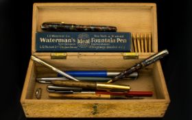 A Box Containing A Variety Of Vintage Fountain Pens And Nibs Rectangular hinged wooden box