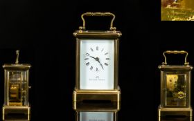 Matthew Norman Superb Quality Brass Cased Carriage Clock with visible escapement, glass panel sides,