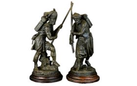 Late 19thC Pair of Tall And Impressive Realistic Spelter Figures each raised on a circular stepped