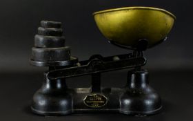 Traditional Brass Kitchen Scales Comprising Eight weights, black cast iron finish with traditional