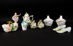 Collection of German Encrusted Pottery to include ballerina figure, Oil pourers, baskets,