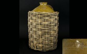 T. D. Jackson Wine and Spirit Merchant of Ambleside Stoneware Flagoon of Large Size, with Wicker