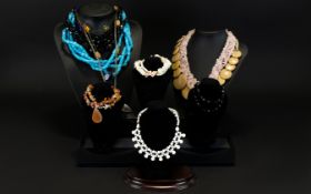 A Collection Of Vintage And Semi Precious Statement Necklaces Eleven in total to include double